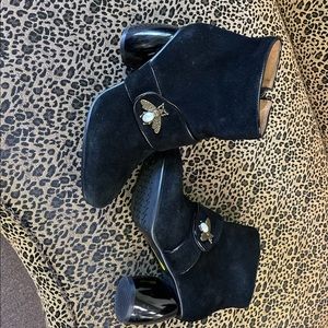Boutique brand black suede booties with bee and “pearl” detail